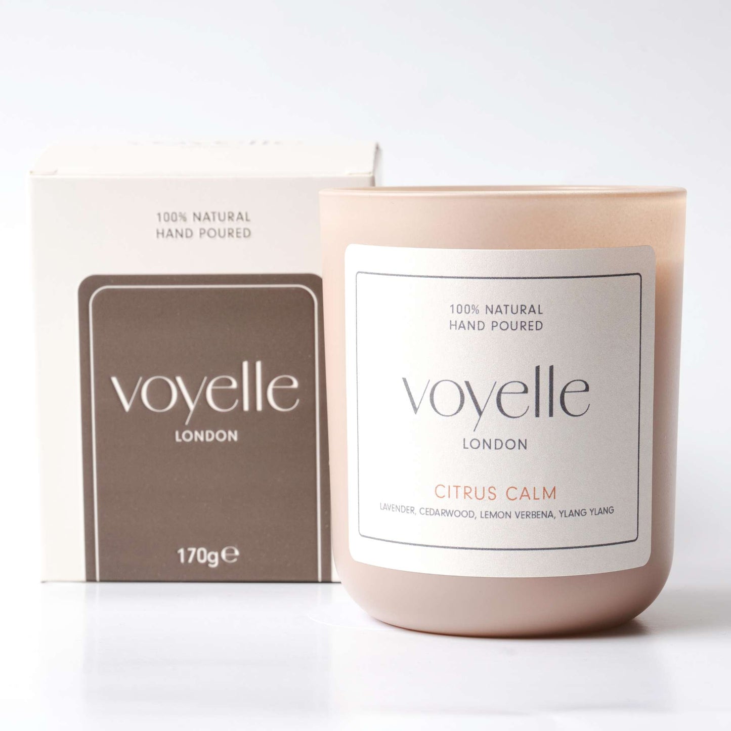 Voyelle Citrus Calm candle with packaging, featuring clean design and natural ingredients