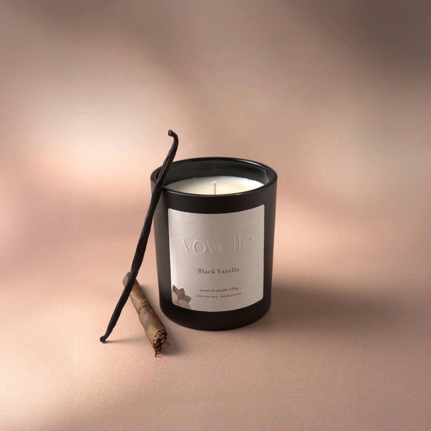 Hand-poured Black Vanilla soy candle by Voyelle with natural vanilla and cinnamon – luxury aromatherapy gift