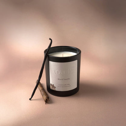 Hand-poured Black Vanilla soy candle by Voyelle with natural vanilla and cinnamon – luxury aromatherapy gift