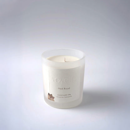 Voyelle Oud Royal scented candle in frosted glass on white background