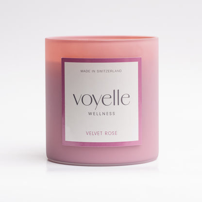 Velvet Rose dusky-pink glass candle with front label, studio portrait